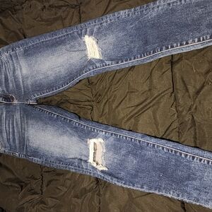 Distressed Blue Denim Jeans